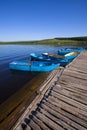 Small vessels arranged together in a lake, in the fall