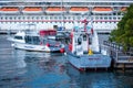 Small boats docked next to the Carnival Vista in Roatan Honduras