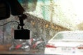 Small video camera record inside motor vehicle on windshield Royalty Free Stock Photo