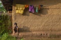 Small village boy sitting outside house in Nangur Village near Jagdalpur,Chhattisgarh,India