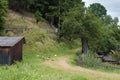 Rural landscape. Chicken and small houses.