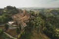 Small village of Chiusure on top of the hill surrounded by Karst cliffs landscape photographed with a drone. Royalty Free Stock Photo