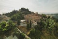 Small village of Chiusure on top of the hill surrounded by Karst cliffs landscape photographed with a drone. Royalty Free Stock Photo