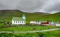 Small village church with cemetery in Gjogv, Faroe Islands, Denmark Royalty Free Stock Photo