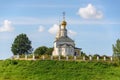 A small village church on a high hill. Church on the banks of the river. Royalty Free Stock Photo