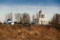 A small village church on a high hill. Church on the banks of the river. Old Orthodox Church Royalty Free Stock Photo