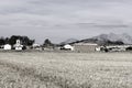 Small village with farm and church Royalty Free Stock Photo