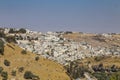 Small village and the Israeli West Bank barrier or wall - separation barrier on the West Bank in Israel. View from Montefiore Royalty Free Stock Photo