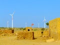 Small village with traditional houses in Thar desert, India Royalty Free Stock Photo