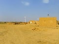 Small village with traditional houses in Thar desert near Jaisal Royalty Free Stock Photo