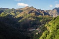 Small village under the mountains with green forest Royalty Free Stock Photo