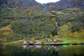 Small village on the waterfront and mountains in the autumn season at Flam in Norway Royalty Free Stock Photo