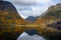 Small village on the waterfront and mountains in the autumn season in Norway Royalty Free Stock Photo