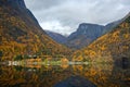 Small village on the waterfront and mountains in the autumn season at Flam in Norway Royalty Free Stock Photo