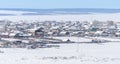Small village in winter on the island at frozen lake Baikal in Siberia, Russia Royalty Free Stock Photo