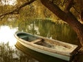 Small vintage boat in the sunset Royalty Free Stock Photo