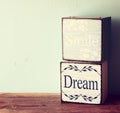Small vintage boxes over wooden background