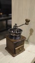 Small vintage manual coffee grinder Royalty Free Stock Photo