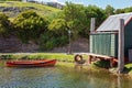 Small Vintage Red Boat Moored At Old Jetty Royalty Free Stock Photo