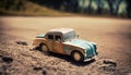 Small vintage style tin car on a dirt road. Old toy car. Collection vehicle. Royalty Free Stock Photo