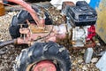 A small walk-behind tractor for plowing a garden is in the garage Royalty Free Stock Photo