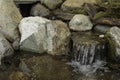 Small water feature waterfall Royalty Free Stock Photo