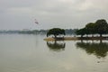 Small Water Lake and Blue Cloudy Sky Green Trees Reflation in Water