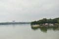 Small Water Lake and Blue Cloudy Sky Green Trees Reflation in Water