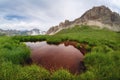 Small water natural pool on the path to Rocca la Meja, one of the most important peaks of the piedmontese Alps Royalty Free Stock Photo