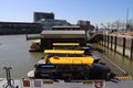 Small water taxi ships at a pier in the port of Rotterdam the Netherlands