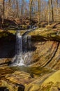 A small waterfall in the autumn in the forest in the parkon Brandywine Creek in Cuyahoga Valley National Park, Ohio Royalty Free Stock Photo