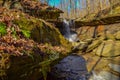 A small waterfall in the autumn in the forest in the parkon Brandywine Creek in Cuyahoga Valley National Park, Ohio Royalty Free Stock Photo