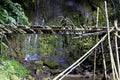 Small waterfall with bamboo bridge prior to the rainy season, oaxaca Royalty Free Stock Photo