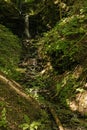 Small waterfall in a forest near Kroev