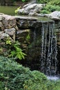 Small waterfall in garden Royalty Free Stock Photo