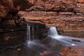 Small waterfall inside karijini National park Western Australia Royalty Free Stock Photo