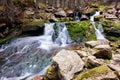 Small waterfall in the middle of forest Royalty Free Stock Photo