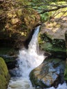 Small waterfall over rocks on Greaves Creek on the Grand Canyon Walking Track Royalty Free Stock Photo