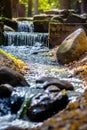 A small waterfall on the river in the autumn Park. Royalty Free Stock Photo