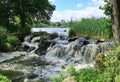 Small waterfall on the River Eden in the Kent countryside Royalty Free Stock Photo