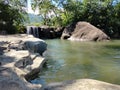small waterfall from a river leuwi pangaduan Royalty Free Stock Photo