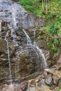 Small waterfall on the rocks in the Alps Royalty Free Stock Photo