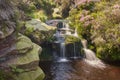 Small waterfall on the rocks in the Peak District near Middle Black Clough Royalty Free Stock Photo