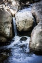 Small Waterfall Running Through A Creek