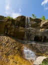 Waterfall rushing from a mount wall