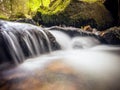 Small waterfall in Slovakia forest in autumn Royalty Free Stock Photo