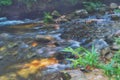 Small waterfall ,stream running water over the rock Royalty Free Stock Photo