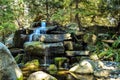 A scenic garden waterfall Royalty Free Stock Photo