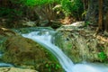 Waterfall in tropical deep forest at Erawan National Park Royalty Free Stock Photo