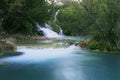 A small waterfall with turquoise water in Plitvice Lakes National Park in Croatia Royalty Free Stock Photo